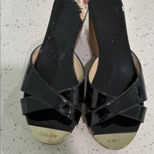 Jimmy Choo Black Patent Leather Mules with Gold Accents